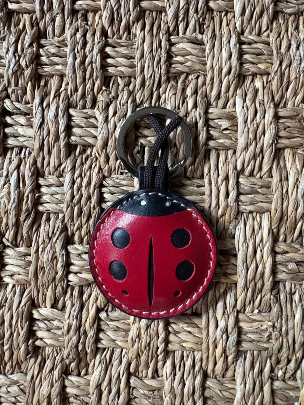 NWOT Barney’s New York Ladybug keychain/bag charm in red & black leather